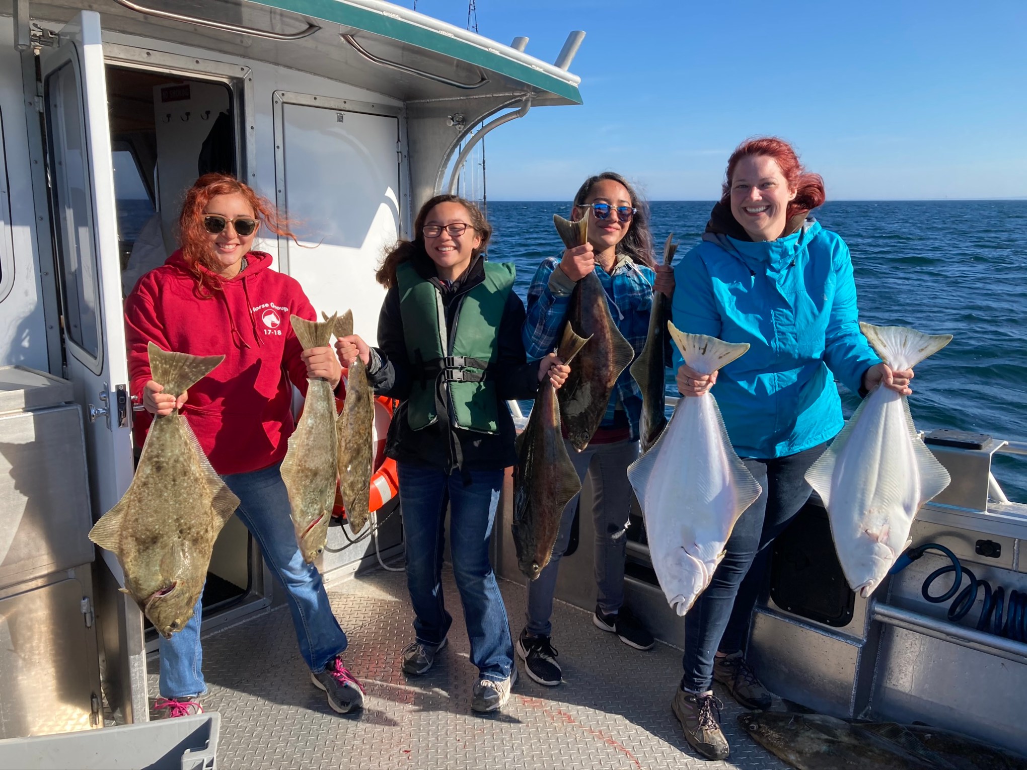 a group of people posing for the camera