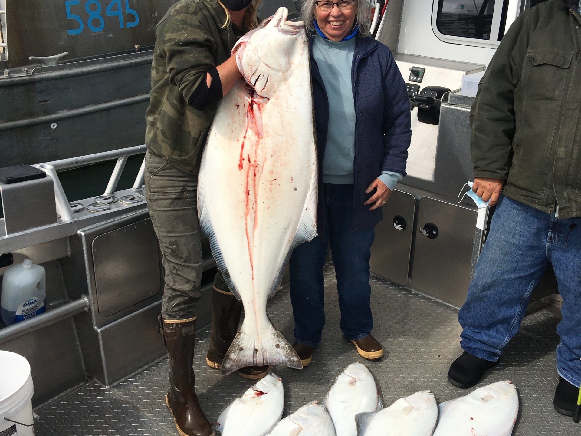 a person holding a fish