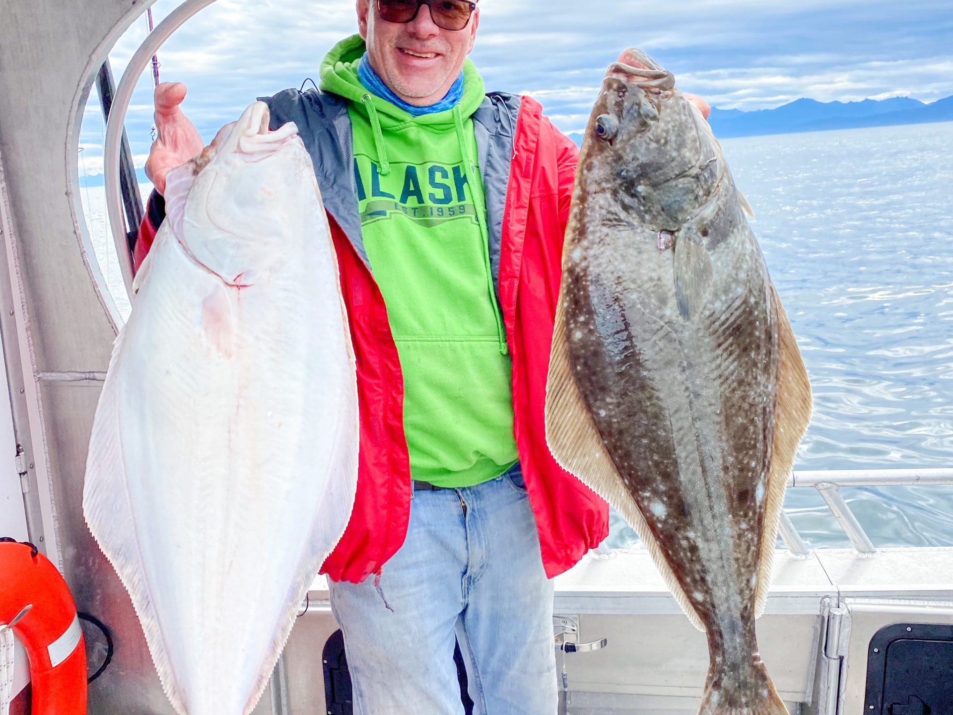 a person holding a fish