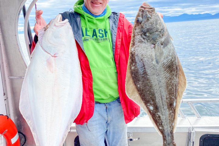 a person holding a fish