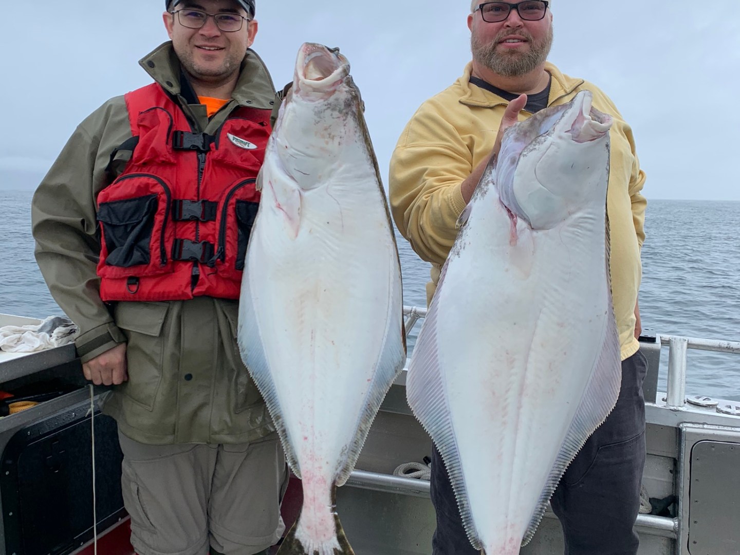 a man holding a fish