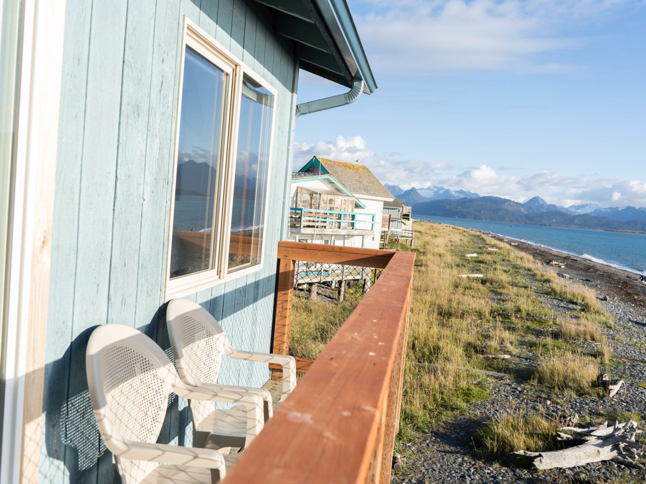 a wooden bench overlooking a body of water