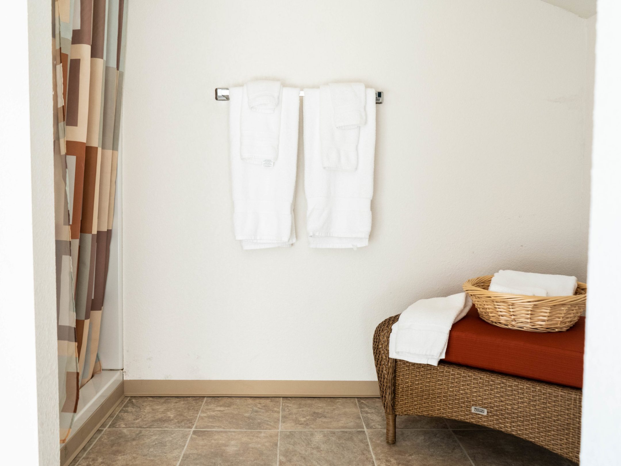 a bedroom with a bed and a mirror