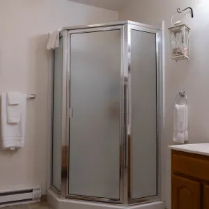 a room with a sink and a mirror