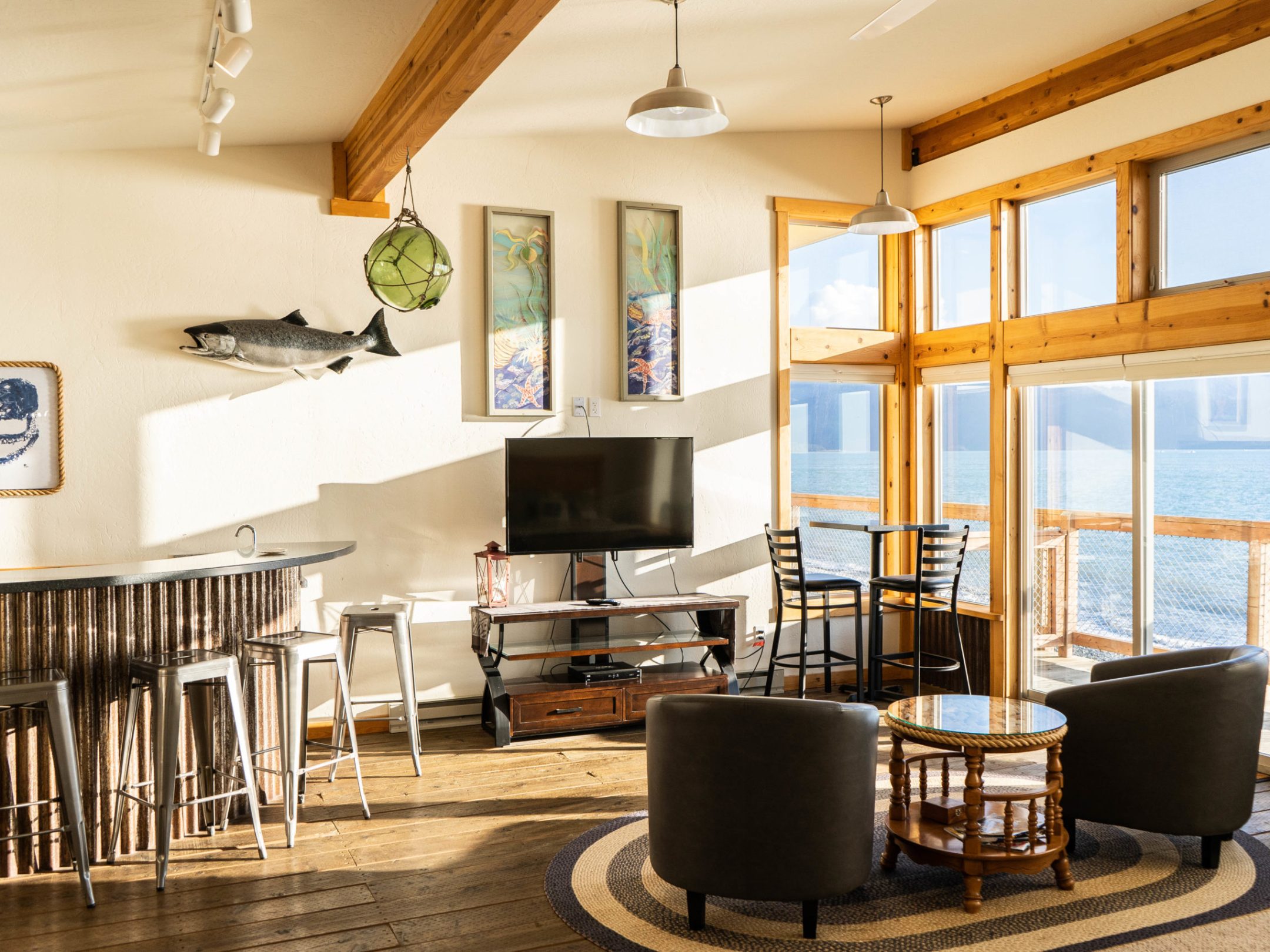 a room filled with furniture and a large window