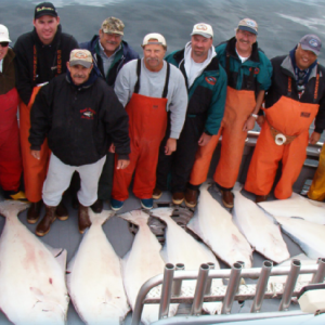 Men on boat with their catch