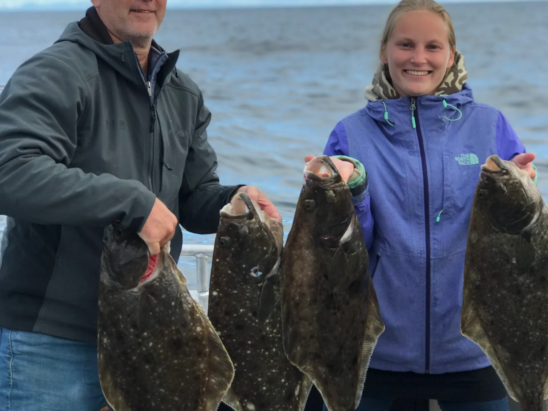 a person holding a fish