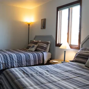 a bedroom with a bed in a hotel room