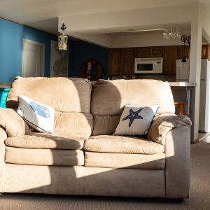 a living room filled with furniture and a fireplace