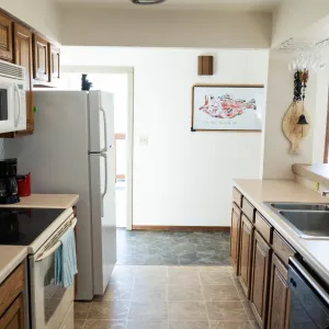 a kitchen with a stove top oven
