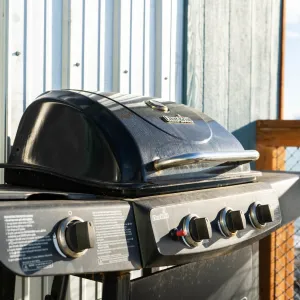 a motorcycle is parked in front of a window