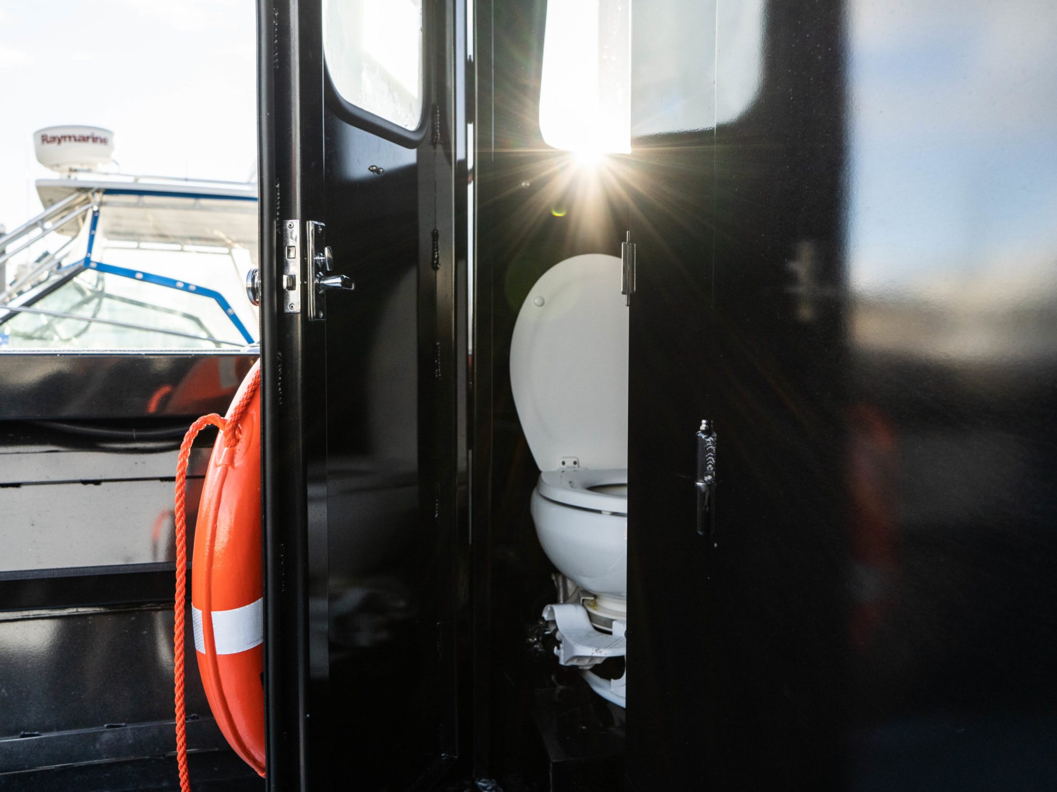 a car parked in front of a mirror posing for the camera