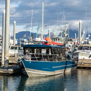 a boat is docked in a harbor