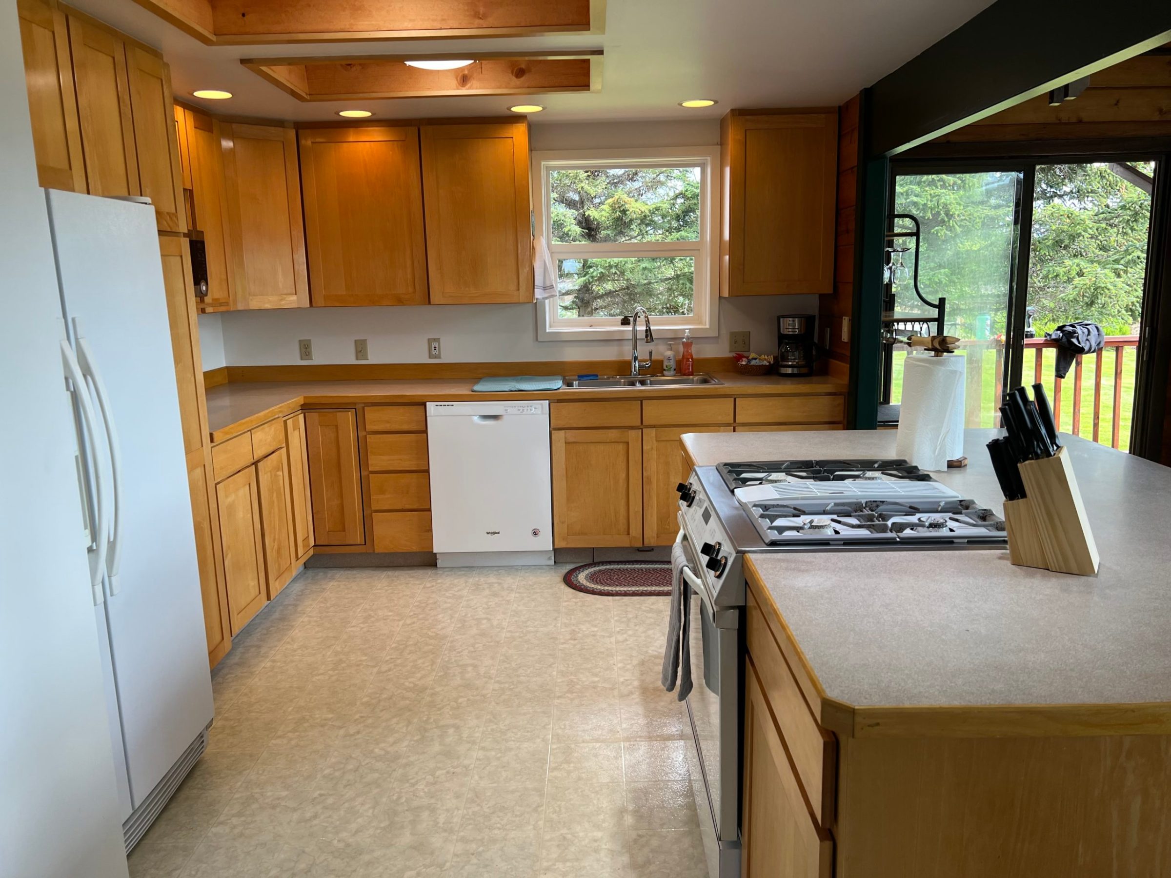 a kitchen with a wood floor