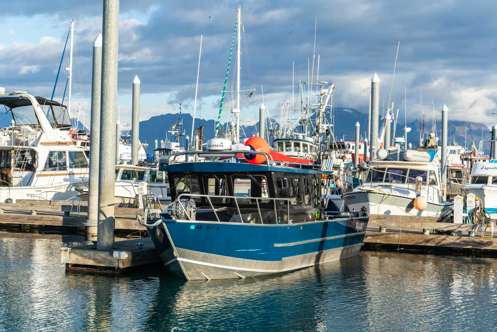 a boat is docked in a harbor